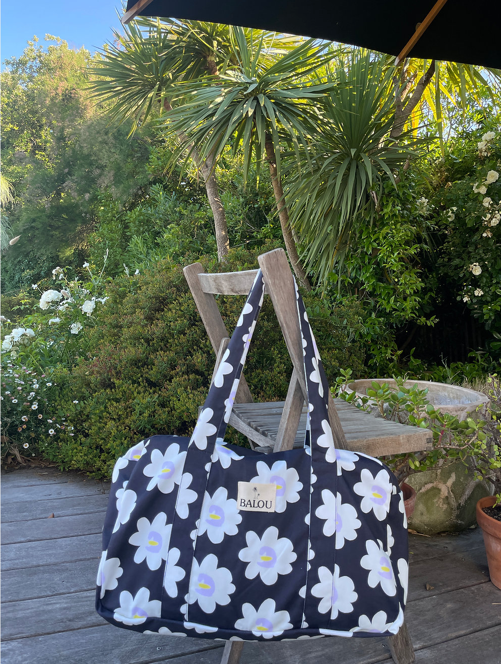 Black and white Mini Museum tote bag with polka dots